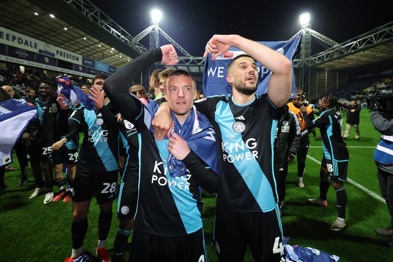 Jamie Vardy and Conor Coady celebrate at full-time following Leicester City's victory over Preston North End at Deepdale to secure the Championship title. Getty Images
