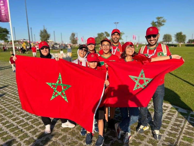 From right, Morocco fans Salah Makoudi, Hyat Makoudi, Yassine Bihi, Adam Bihi, Jad Bihi and three other women from the family who did not want to give their names after the match with Croatia. Sarah Foster / The National