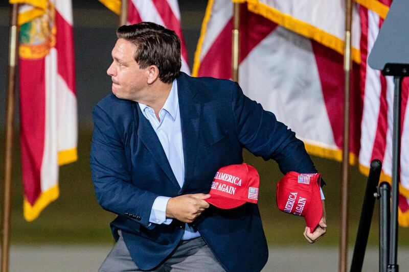 Florida Governor Ron DeDantis throws hats to the crowd at a rally for US President Donald J. Trump in Pensacola, Florida, USA. The United States will hold its presidential election on 03 November 2020.  EPA