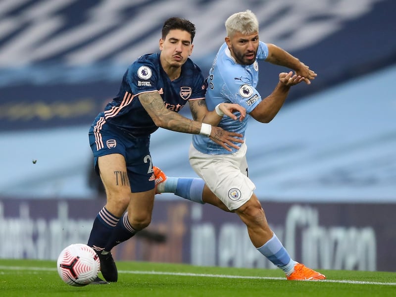 Arsenal defender Hector Bellerin, left, and City attacker Sergio Aguero battle for possession.