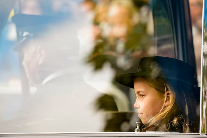 Princess Charlotte arrives by car ahead of the funeral in central London. AP