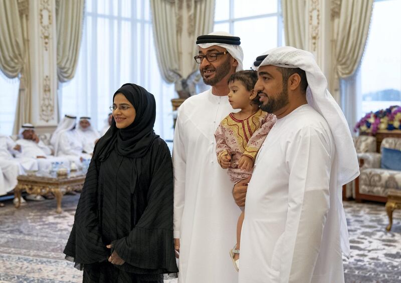 ABU DHABI, UNITED ARAB EMIRATES - October 21, 2019: HH Sheikh Mohamed bin Zayed Al Nahyan, Crown Prince of Abu Dhabi and Deputy Supreme Commander of the UAE Armed Forces (2nd L), stands for a photograph with family members who received "Amntk Bladk" token, during a Sea Palace barza.

( Mohamed Al Hammadi / Ministry of Presidential Affairs )
---