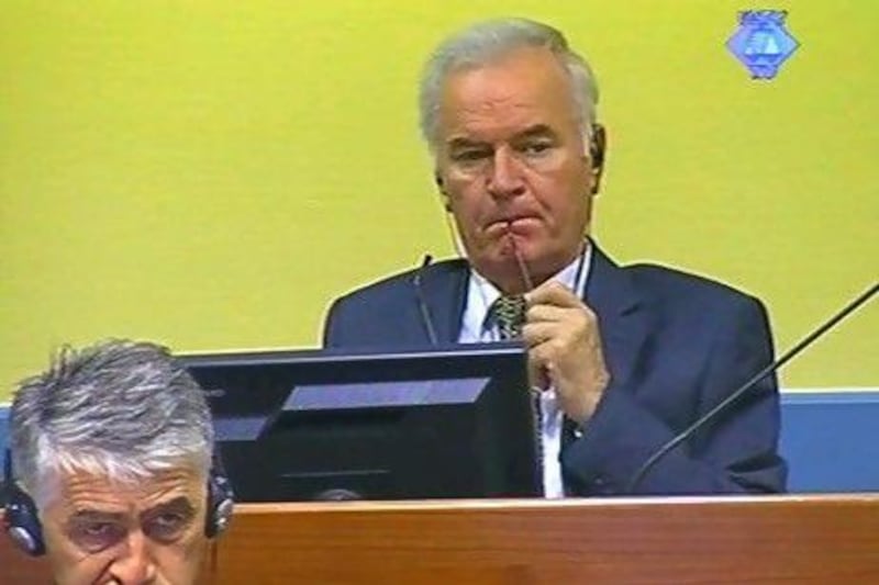 Former Bosnian Serb military chief Ratko Mladic in the court room in The Hague. Mladic faces 11 charges of genocide, war crimes and crimes against humanity. He denies wrongdoing.