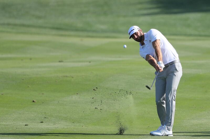 ABU DHABI, UNITED ARAB EMIRATES - JANUARY 16:  Dustin Johnson of the United States plays a shot on the eighth hole during practice rounds for the Abu Dhabi HSBC Golf Championship at Abu Dhabi Golf Club on January 16, 2018 in Abu Dhabi, United Arab Emirates.  (Photo by Matthew Lewis/Getty Images)