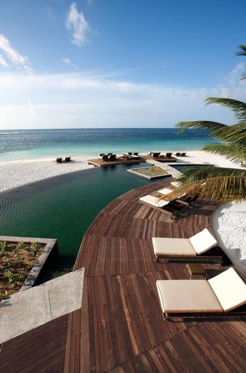 The pool view at Constance Moofushi. Courtesy Constance Hotels