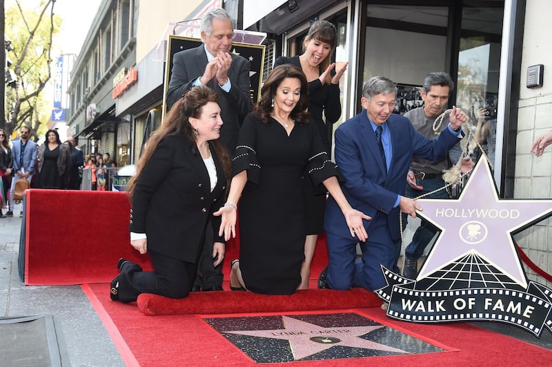 Lynda Carter, centre, reacts as her star is unveiled on the Hollywood Walk of Fame. From left: Donelle Dadigan, Leslie Moonves, Lynda Carter, Patty Jenkins and Leron Gubler. Robyn Beck / AFP