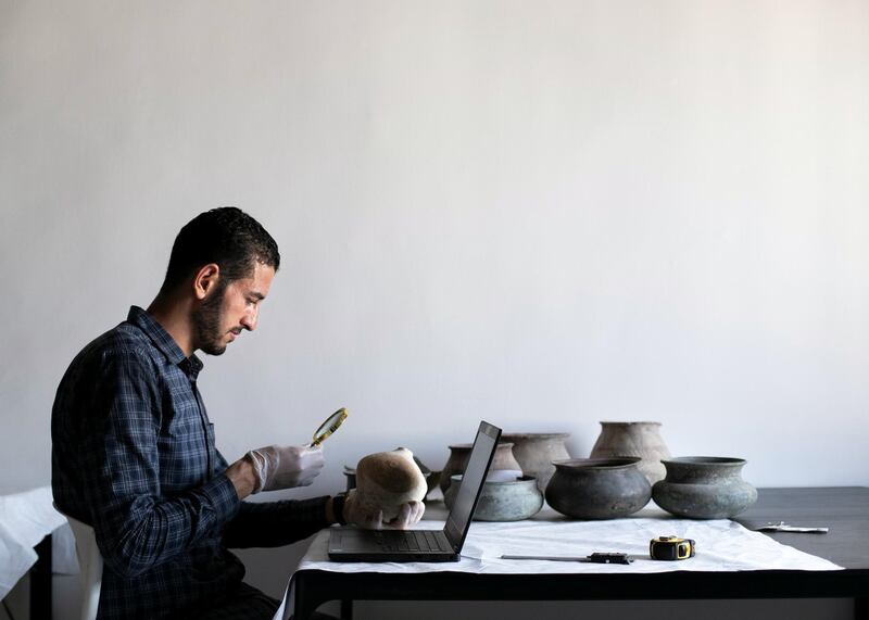 RAS AL KHAIMAH, UNITED ARAB EMIRATES - JULY 21 2019.

Ismail Sabry Draz, Head of Collection Unit at Ras Al Khaimah National Museum, carries out a visual documentation of found artifacts.

Around 20,000 archaeological artifacts have been documented by RAK antiquities and museums department as part of a three-year plan to document 100,000 artefacts. 

(Photo by Reem Mohammed/The National)

Reporter: 
Section: AC
