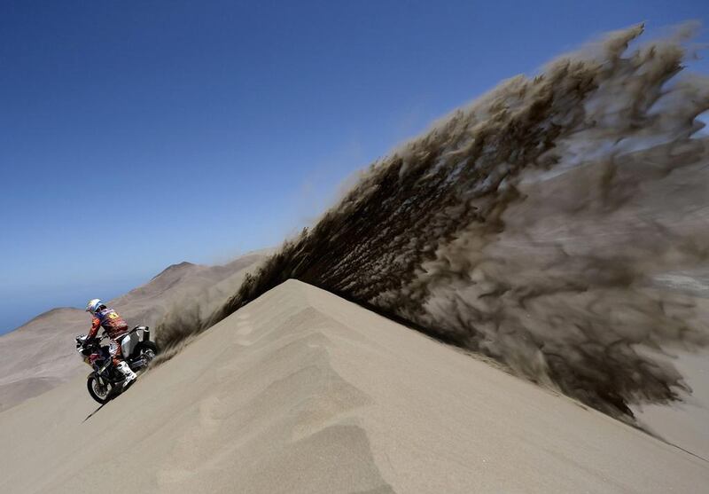 Spain’s Jordi Viladoms rides his KTM motorcycle at the Dakar Rally 2014. Franck Fife / Pool