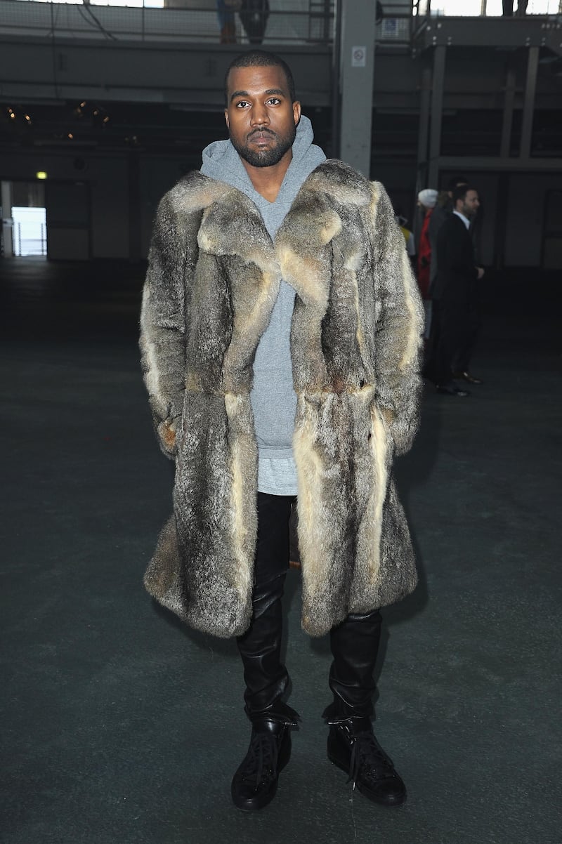PARIS, FRANCE - JANUARY 17:  Kanye West attends the Givenchy Menswear Fall/Winter 2014-2015 Show as part of Paris Fashion Week on January 17, 2014 in Paris, France.  (Photo by Pascal Le Segretain/Getty Images)