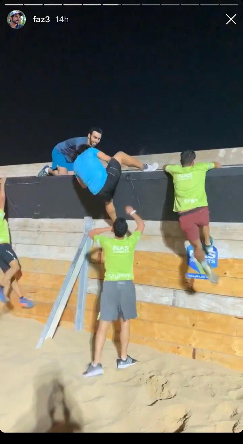 Sheikh Hamdan bin Mohammed, the Crown Prince of Dubai, cheered on friends at a night-time assault course. Instagram.