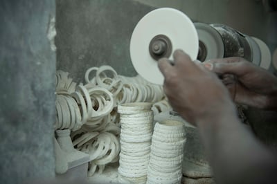 Shankhari makers create bangles from conch shells called shankha. Ritam Ghosal and Archi Banerjee for The National