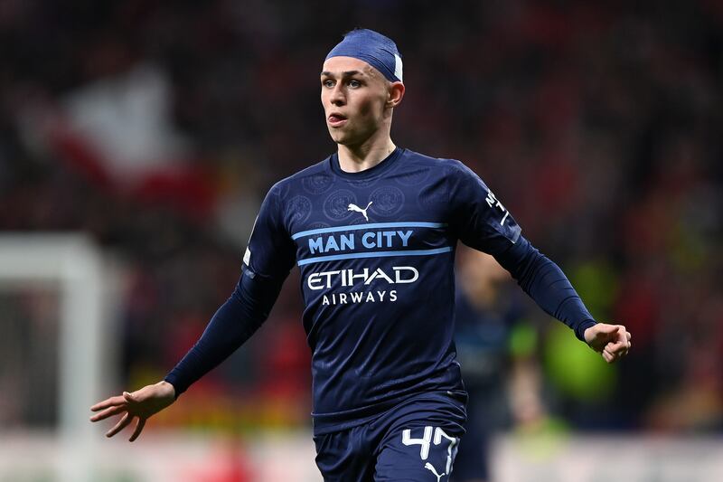 Phil Foden of Manchester City with a bandage on his head. Getty