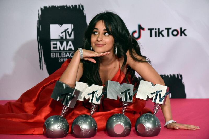 epaselect epa07142006 Cuban singer Camila Cabello poses for the photographers after receiving several awards during the 2018 MTV Europe Music Awards at Bilbao Exhibition Centre, in Bilbao, Basque Country, Spain, 04 November 2018.  EPA/MIGUEL TONA