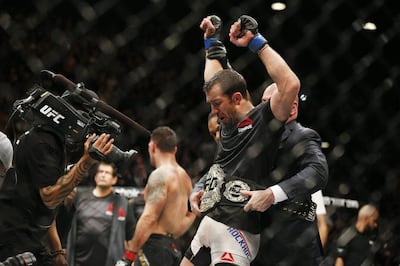 Luke Rockhold takes the UFC middleweight title after defeating Chris Weidman at UFC 194. AP