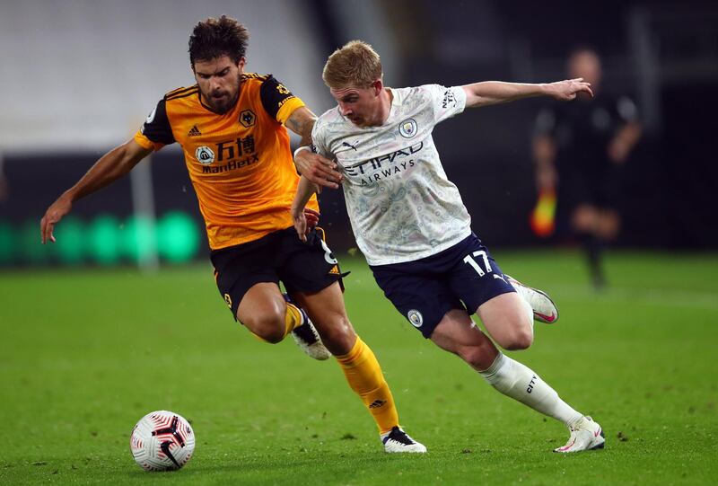 Ruben Neves of Wolves in action against Kevin De Bruyne of Manchester City. EPA