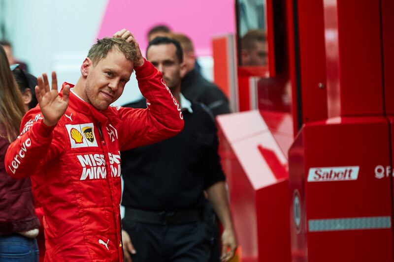 epa07382951 German Formula One driver Sebastian Vettel of Scuderia Ferrari greets fans on the third day of the official Formula One pre-season testing at Barcelona-Catalunya circuit in Montmelo, near Barcelona, Spain, 20 February 2019.  EPA/ALEJANDRO GARCIA