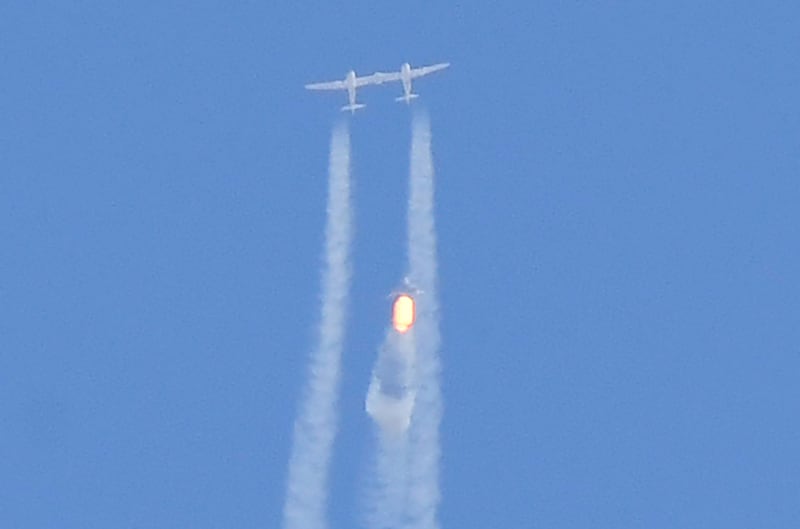 The 'VSS Unity' and its mothership separate above Spaceport America.