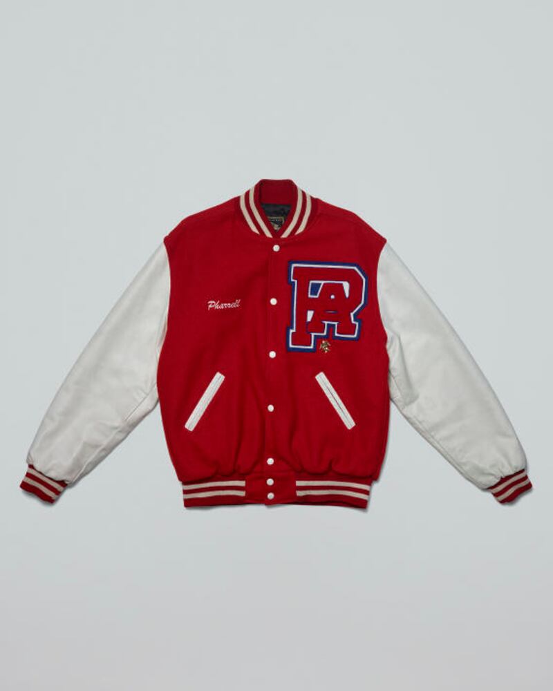 A letterman jacket from Princess Anne High School- that Williams graduated from in 1991- with his name embroidered onto the front. He wore the jacket in the N.E.R.D. "Maybe" video. Valued at $4,800.