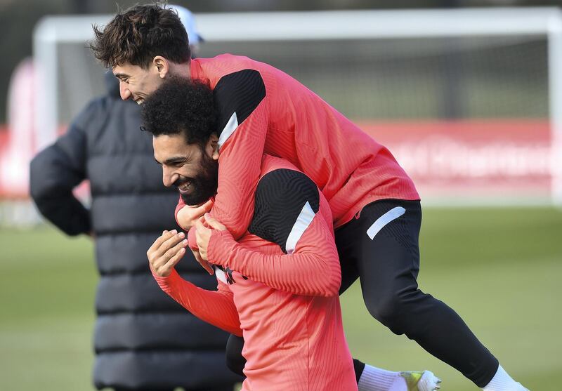 KIRKBY, ENGLAND - APRIL 13: (THE SUN OUT. THE SUN ON SUNDAY OUT) Kostas Tsimikas and Mohamed Salah of Liverpool during a training session at AXA Training Centre on April 13, 2021 in Kirkby, England. (Photo by John Powell/Liverpool FC via Getty Images)