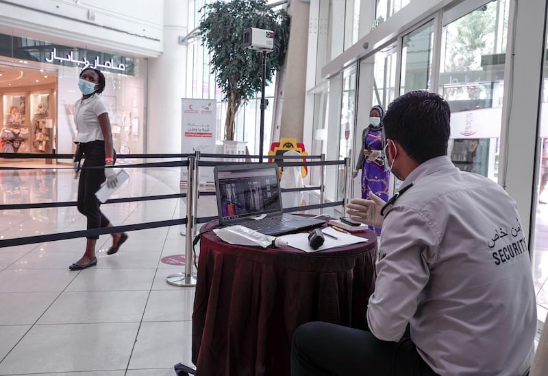 Abu Dhabi, United Arab Emirates, May 10, 2020.  
 The reopening of the Al Wahda Mall during the Coronavirus pandemic.  Thermal scanners at the mall entrance.
Victor Besa/The National
Section:  NA
Reporter: