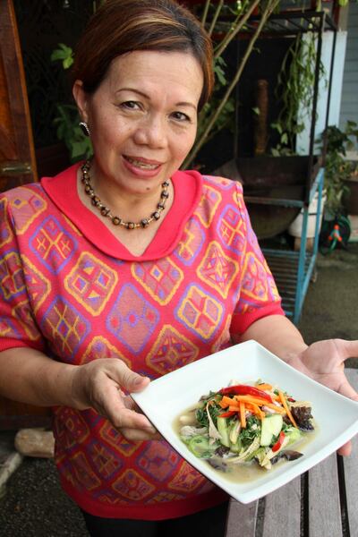 Rosalyn, owner of Lepau Restaurant in Kuching, Sarawak, Malaysia