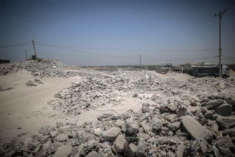 Rocks from the recycled rubble of buildings destroyed during the May rocket attacks. Sanad Latefa for The National