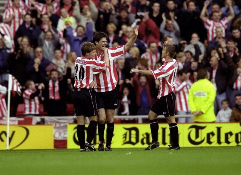 31 Oct 1999:  Niall Quinn of Sunderland celebrates his goal against Tottenham Hotspur with team mates Stefan Schwarz and Kevin Phillips during the FA Carling Premiership match at the Stadium of Light in Sunderland, England. Sunderland won 2-1. \ MandatoryCredit: Clive Brunskill /Allsport