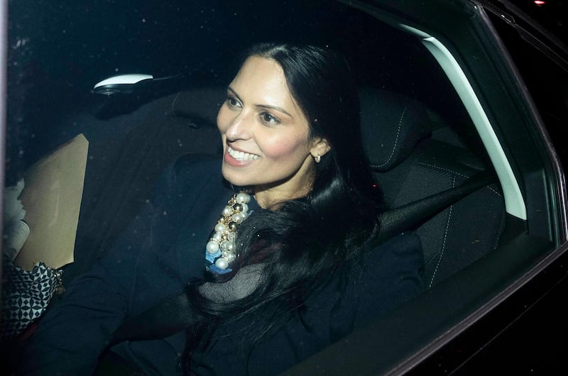 epa06316523 British International Secretary Priti Patel leaves number 10 Downing street through the back entrance in London, Britain, 08 November 2017. According to media on 08 November 2017, Patel has come under pressure after reports emerged that she had allegedly met secretly with Israeli ministers during vacations earlier in 2017.  EPA/NEIL HALL