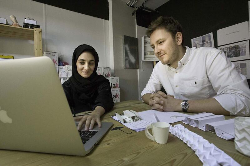 Dubai, United Arab Emirates, Mar 25, 2014 - Designers Kieren Jones (right) and Kholoud pose for a portrait at their office in Karama. They have been working on one of Kholoud's ideas for a new prototype product that is being produced as part of the TCA UAE Young Designer Programme. ( Jaime Puebla / The National Newspaper ) Nick Leech - Review