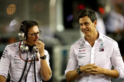 SINGAPORE - SEPTEMBER 16: Mercedes GP Executive Director Toto Wolff (R) and engineer Andrew Shovlin talk in the Pitlane before the Formula One Grand Prix of Singapore at Marina Bay Street Circuit on September 16, 2018 in Singapore.  (Photo by Charles Coates/Getty Images)