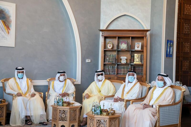Sheikh Mohammed bin Sultan sits with his father, Sheikh Sultan bin Khalifa, advisor to the UAE President, during his wedding reception. Courtesy: Sheikh Mohamed bin Zayed Twitter