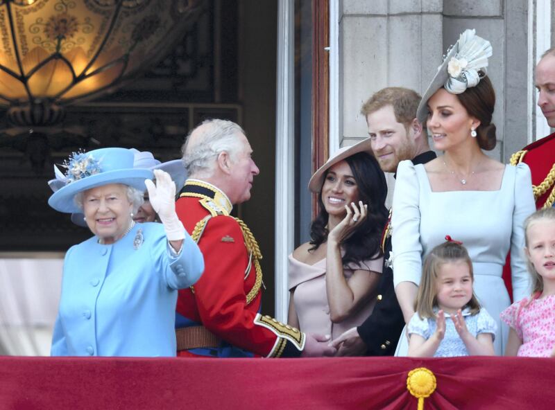 LONDON, ENGLAND - JUNE 09:  Queen Elizabeth II, Prince Charles, Prince of Wales, Meghan, Duchess of Sussex, Prince Harry, Duke of Sussex, Catherine, Duchess of Cambridge and Princess Charlotte of Cambridge on the balcony of Buckingham Palace during Trooping The Colour 2018 at The Mall on June 9, 2018 in London, England. The annual ceremony involving over 1400 guardsmen and cavalry, is believed to have first been performed during the reign of King Charles II. The parade marks the official birthday of the Sovereign, even though the Queen's actual birthday is on April 21st.  (Photo by Karwai Tang/WireImage)