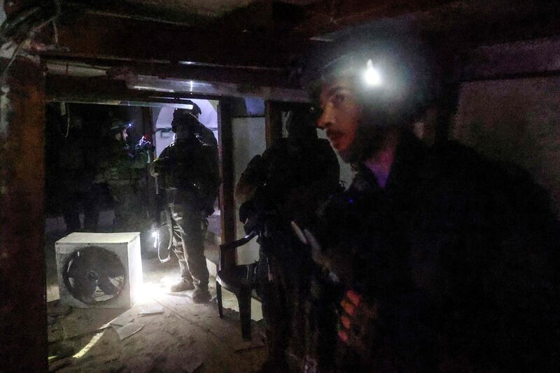 Israeli soldiers inspecting a tunnel in Khan Younis dug by Hamas militants, according to the Israeli army. AFP