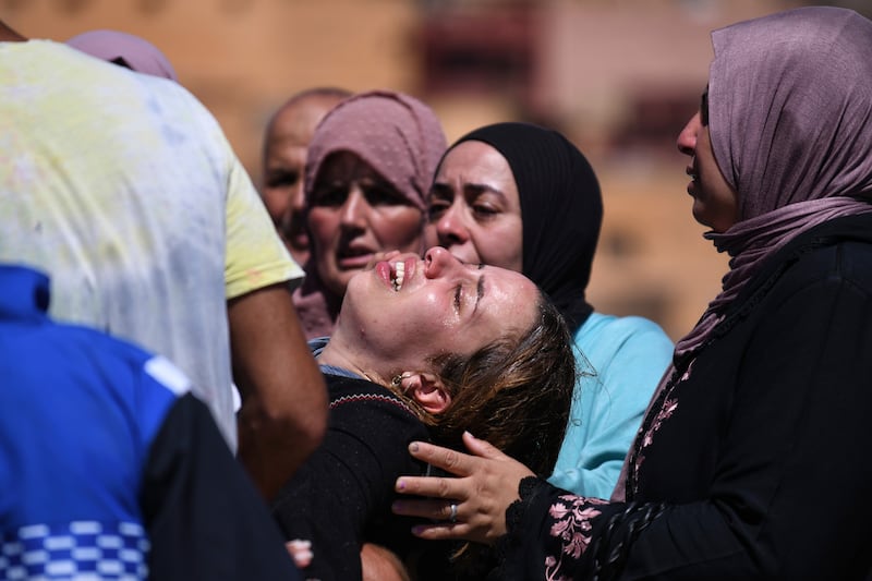 Women cry as they mourn victims of the earthquake in Moulay Brahim in the province of Al Haouz, Morocco. AP Photo