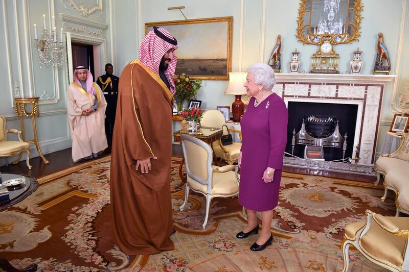 Queen Elizabeth II greets Saudi Arabia's Crown Prince Mohammed bin Salman during a private audience at Buckingham Palace. Getty Images