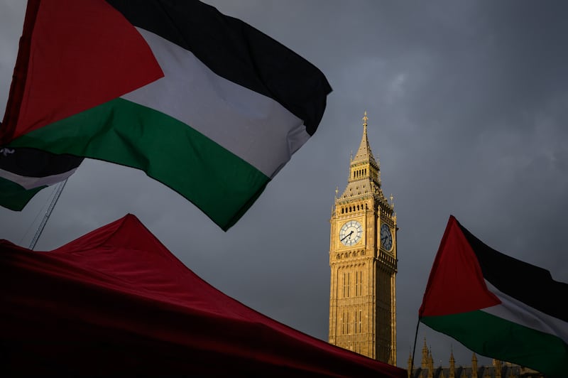 The early evening Sun illuminates Big Ben, as Pro-Palestinian protesters gather in Parliament Square, London, calling for an end to arms exports to Israel. Getty Images
