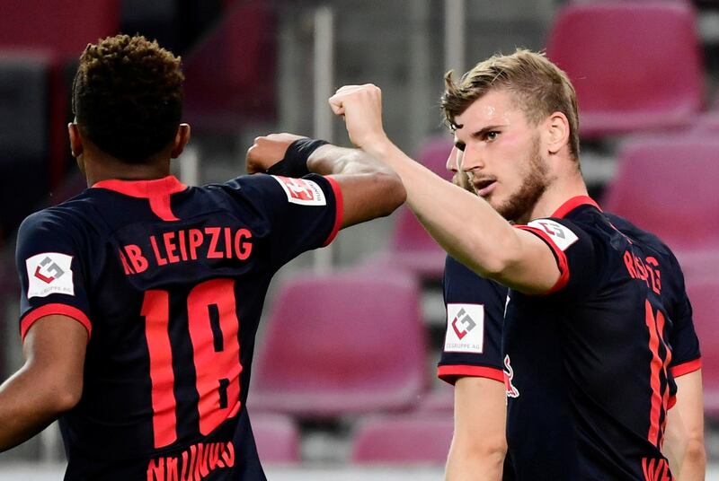 Soccer Football - Bundesliga - FC Cologne v RB Leipzig - RheinEnergieStadion, Cologne, Germany - June 1, 2020 RB Leipzig's Timo Werner celebrates scoring their third goal with Christopher Nkunku, as play resumes behind closed doors following the outbreak of the coronavirus disease (COVID-19) Ina Fassbender/Pool via REUTERS  DFL regulations prohibit any use of photographs as image sequences and/or quasi-video