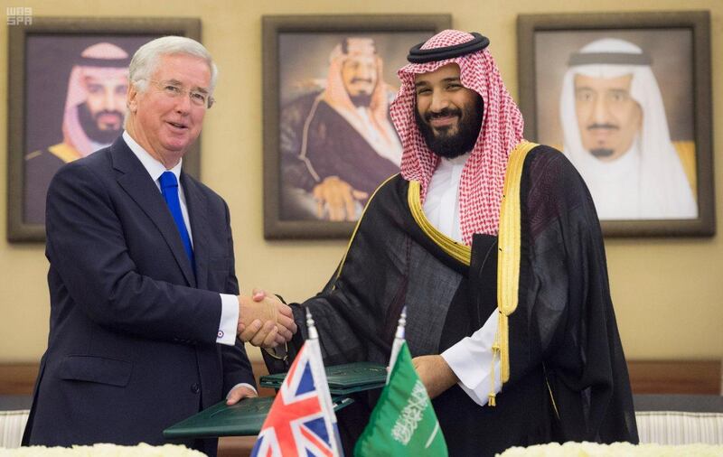 Saudi Crown Prince Mohammed bin Salman shakes hands with British Defence Secretary Michael Fallon after signing agreements in Jeddah, Saudi Arabia September 19, 2017. Saudi Press Agency/Handout via REUTERS ATTENTION EDITORS - THIS PICTURE WAS PROVIDED BY A THIRD PARTY. NO RESALES. NO ARCHIVE.