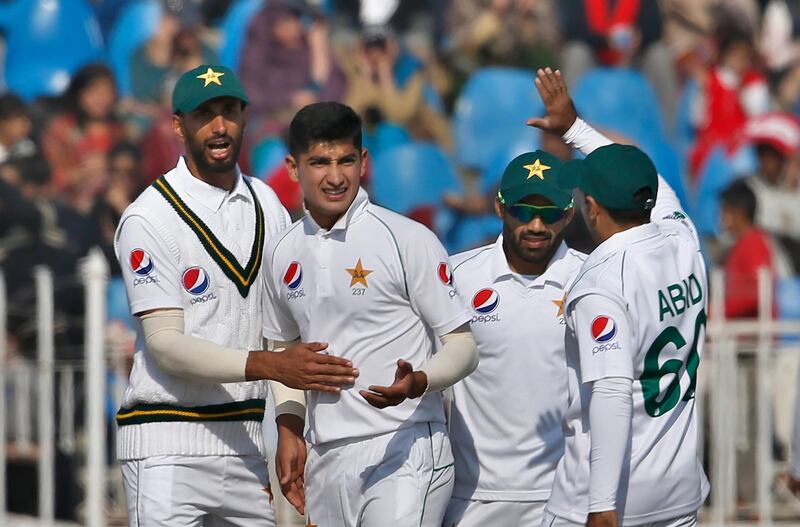 Pakistan pacer Naseem Shah, center, celebrates after taking the wicket of Bangladesh batsman Saif Hassan during the third day of the first Test in Rawalpindi in February. AP