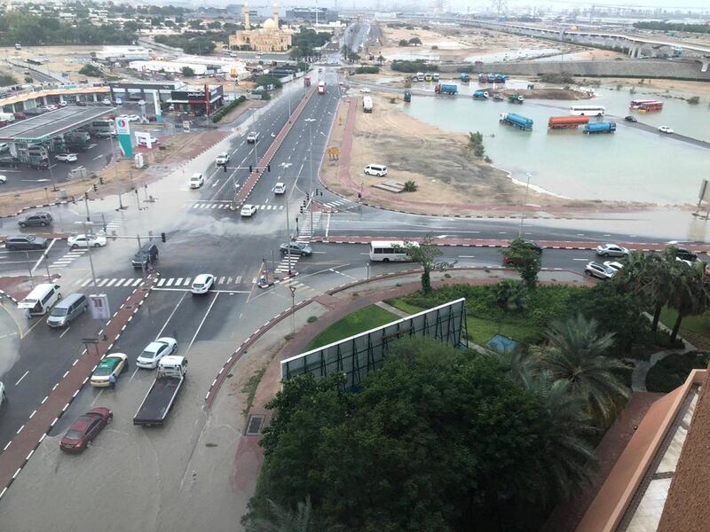 Dubai, United Arab Emirates, January 11, 2020. Water is logged outside the Movenpick Ibn Batutta Gate Hotel from heavy overnight rain. Several cars, including an RTA taxi, were waiting for pick-up trucks after breaking down in the water. James O'Hara / The National