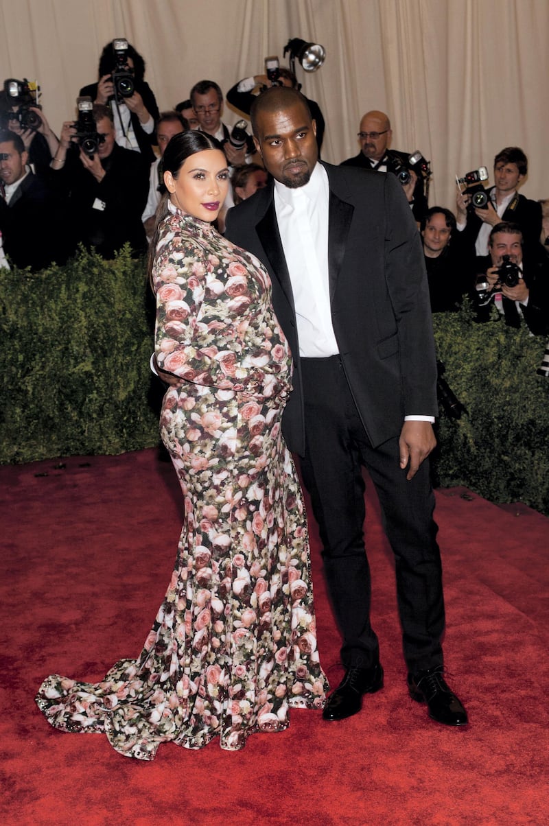 Kanye West and Kim Kardashian attend the Costume Institute Gala for the 'PUNK: Chaos to Couture' exhibition at the Metropolitan Museum of Art in New York City. ÂÂ LAN (Photo by Lars Niki/Corbis via Getty Images)