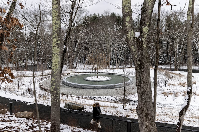 The names of the 20 children and six educators killed a short distance away at Sandy Hook Elementary School are engraved in concrete around the memorial pool with a sycamore tree in the middle. AP