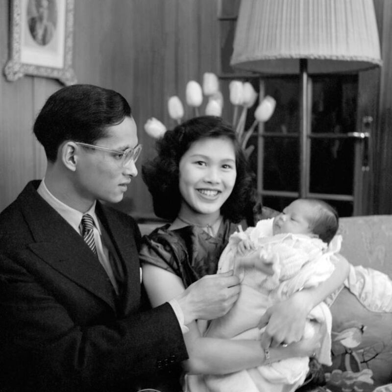 Thai King Bhumibol Adulyadej and Queen Sirikit posing with their first child Princess Ubol Ratana in April 1951. AFP