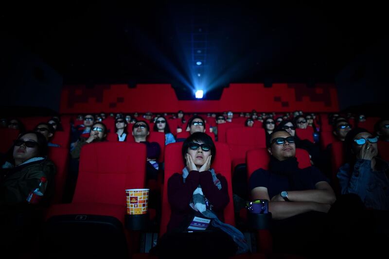 People watching a movie at a cinema in Wanda Group's Oriental Movie Metropolis in Qingdao, China's Shandong province. A massive "movie metropolis" billed as China's answer to Hollywood. Wang Zhao / AFP