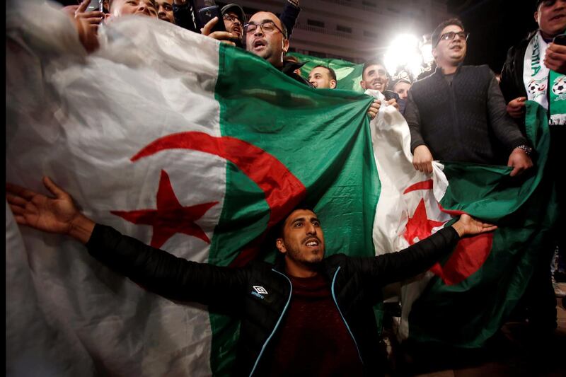 Algerian people celebrate on the streets after Mr Bouteflika submitted his resignation, in Algiers, April 2, 2019. Reuters