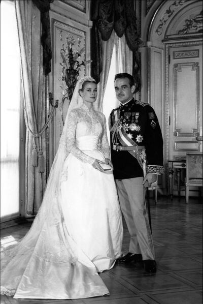 Official picture of US actress Grace Kelly and Prince Rainier of Monaco during their wedding ceremony in Monaco on April 19, 1956. (Photo by AFP)