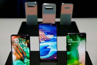 The new Samsung S10 phones are displayed in a demonstration room in San Francisco. AP