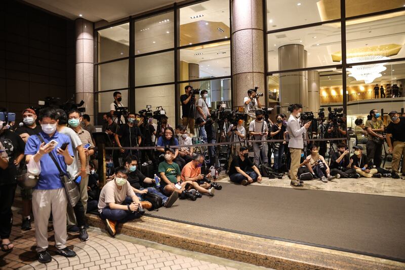 Throngs of media wait outside the Grand Hyatt Taipei. Bloomberg