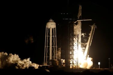 A SpaceX Falcon 9 rocket, with the Crew Dragon capsule, is launched carrying four astronauts on the first operational NASA commercial crew mission at Kennedy Space Center in Cape Canaveral, Florida, U.S. November 15, 2020. REUTERS