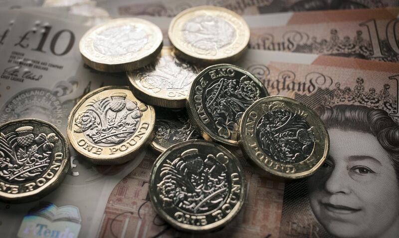 BATH, ENGLAND - OCTOBER 13:  In this photo illustration, Â£1 coins are seen with the new Â£10 note on October 13, 2017 in Bath, England. Currency experts have warned that as the uncertainty surrounding Brexit continues, the value of the British pound, which has remained depressed against the US dollar and the euro since the UK voted to leave in the EU referendum, is likely to fluctuate.  (Photo Illustration by Matt Cardy/Getty Images)
